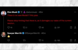 Elon Musk speaking at a press conference or event, denying the release of a new Model Y this year