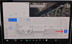 Tesla touchscreen displaying the 'Camp' option on the right side of the climate control menu.