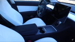Tesla Model 3 and Model Y dashboards showcasing their touchscreen design and specifications.